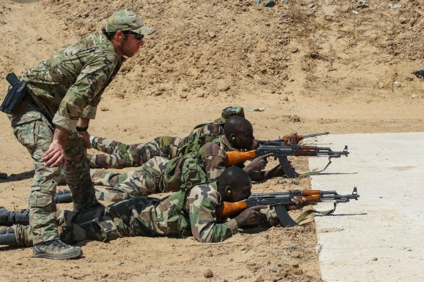 US Army Special Forces Sgt observes Niger Army soldier during marksmanship training Credit AFRICOM